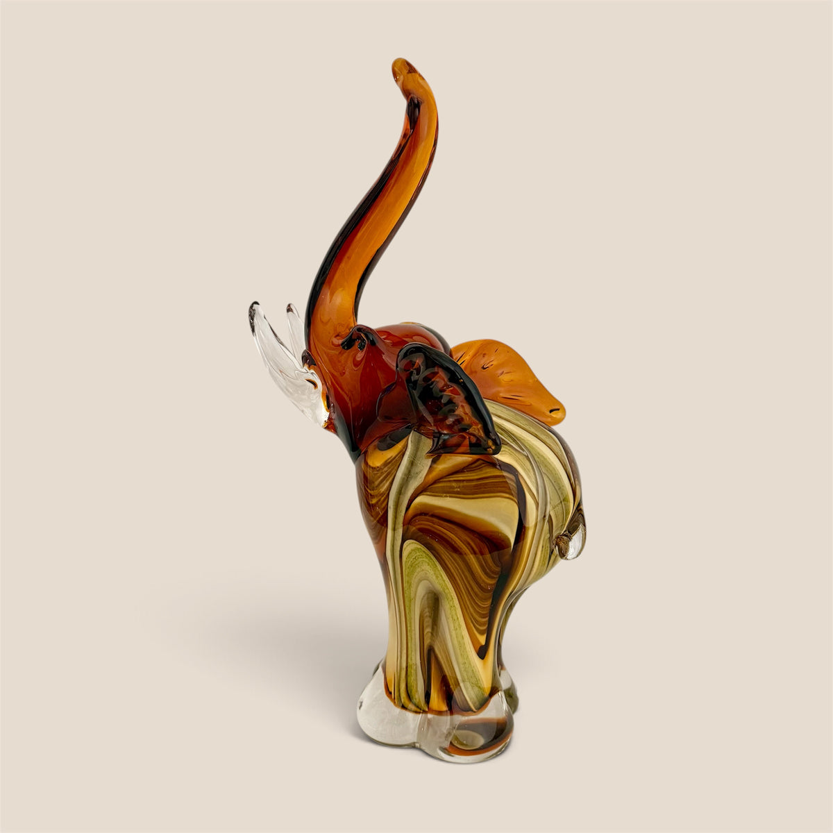 The Amber Glass Elephant ( Delivery only in DELHI NCR)