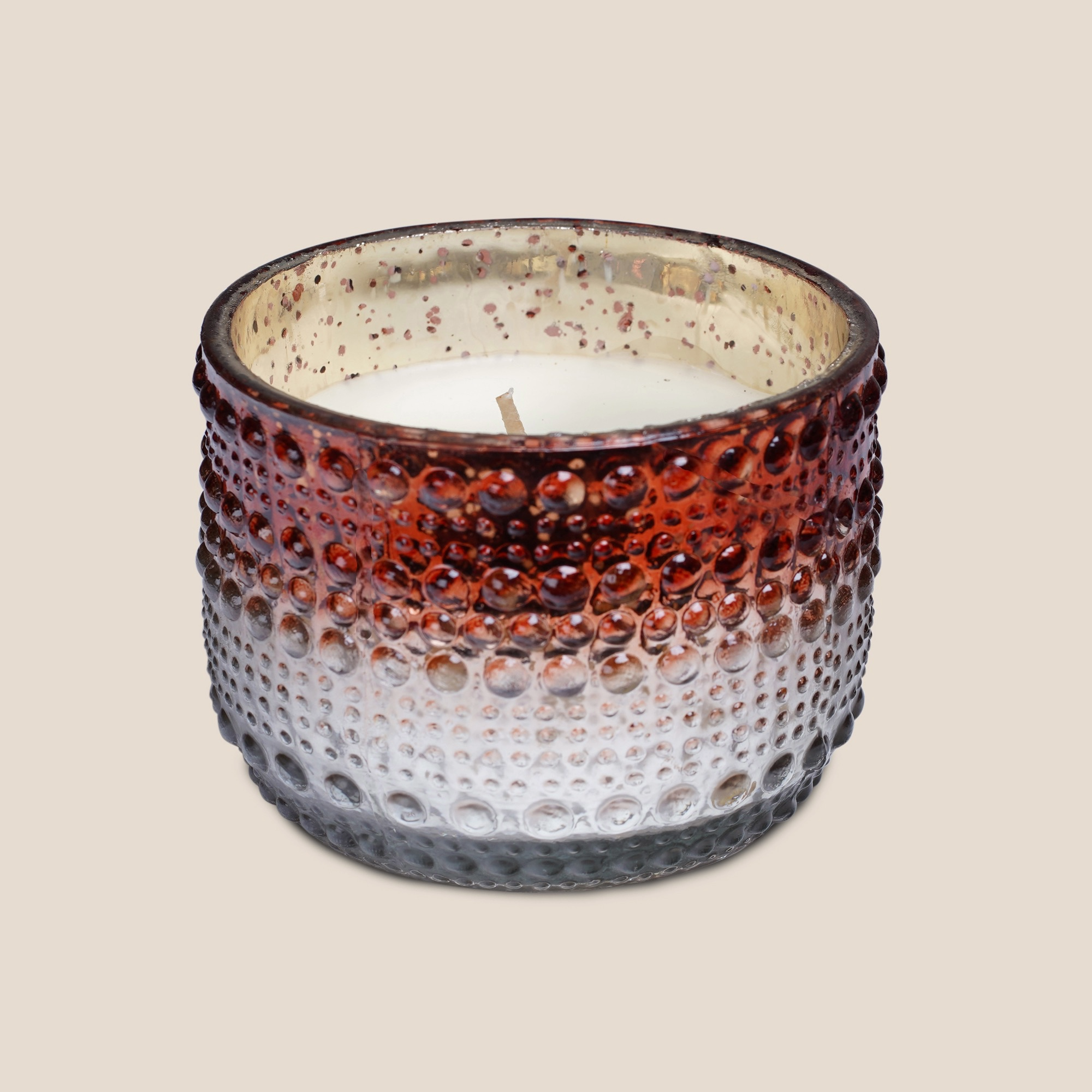 Dimpled Glow – Rust Mist