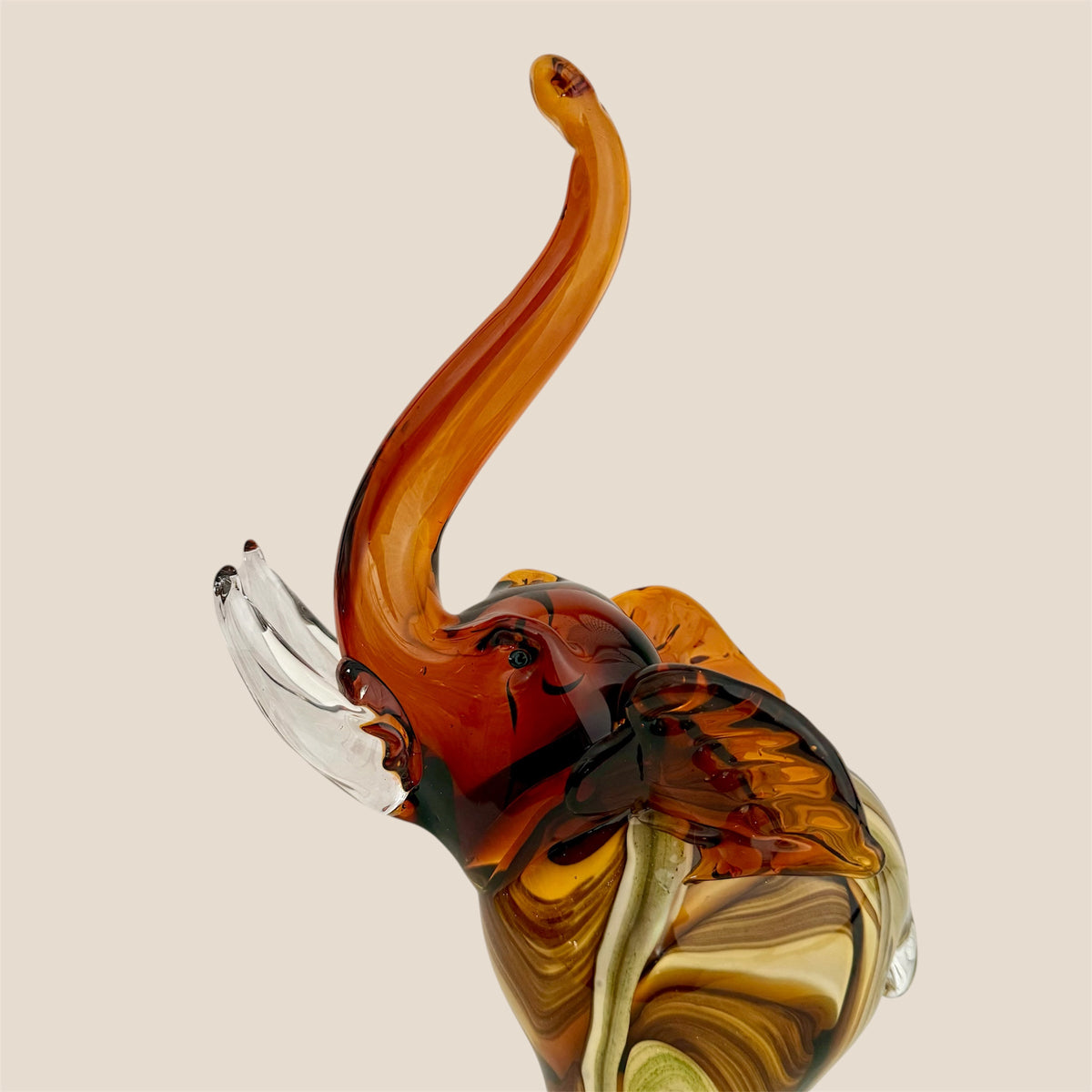 The Amber Glass Elephant ( Delivery only in DELHI NCR)